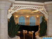 Restaurante L'olivo Piano de cola situado en el interior del Olivo